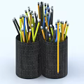 Vibrant Colored Pencils Neatly Stored In Two Black Woven Pencil Holders