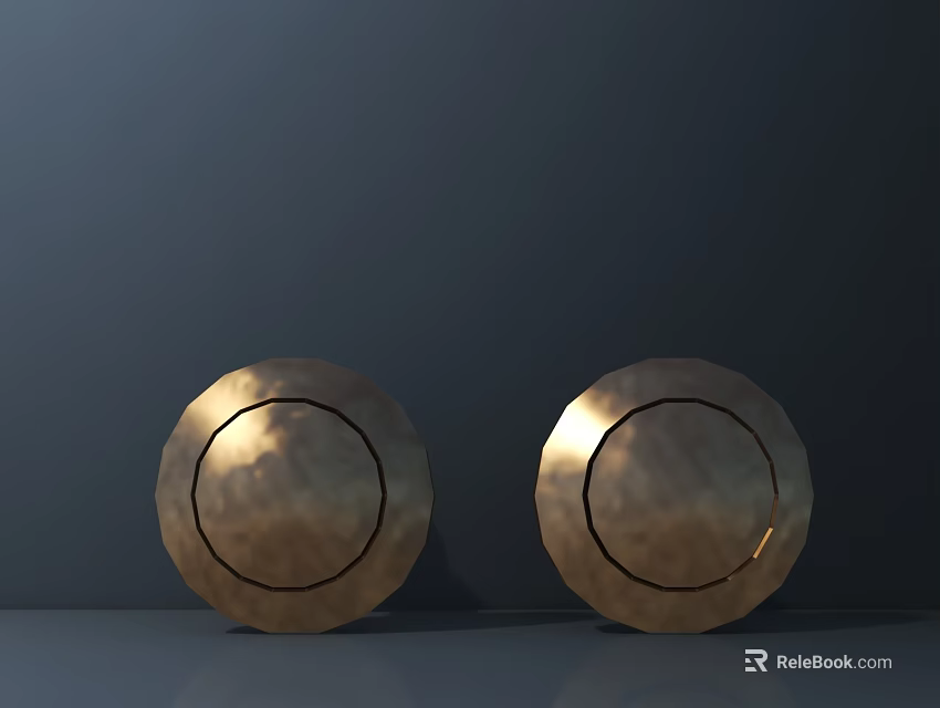 Pair Of Golden Round Metallic Objects With Hammered Texture On Dark Background 3d model 