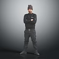 Man In Black Outfit With Beanie Standing Arms Crossed On Gray Gradient Background