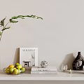 Decorative Ornament Set with Green Fern Clear Glass Vase Books Yellow Fruit Bowl and Ornaments