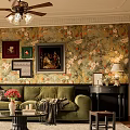 Cozy Vintage Living Room Interior Design With Green Sofa Floral Wallpaper And Ceiling Fan Lights