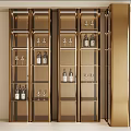 Elegant Gold Wine Cabinet with Glass Shelves Displaying Wine Bottles and Glasses