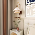 Modern Cloud Shaped Wall Lamp In Bedroom With Decorative Painting Curtains And Nightstand Plant
