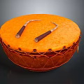 Traditional Orange Hand Drum With Wooden Drumsticks On Top Woven Trim And Leather Straps