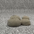 Four Brown Woven Bean Bag Chairs For Comfortable Home Seating On Floor