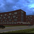 Modern School Building With Red Brick Exterior Glass Curtain Walls Road And Cars At Dusk