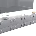 Modern Black TV Stand With Drawers Tray Books And Decorative Bowl In Living Room