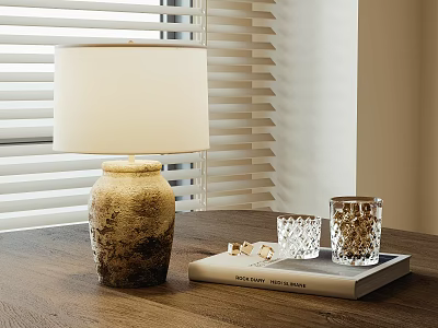 Cream Lampshade Table Lamp With Textured Base On Wooden Table And Decorative Glasses 3d model