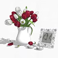 Fresh Red And White Tulips In White Vase With Ornate Photo Frame And Scattered Petals