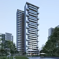High Rise Modern Residential Building with Balconies Surrounded by Trees and Greenery