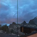 Container Style Hanging Boutique Guesthouse on Mountain Slope with Sunset Sky and Natural Landscape