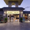 Charming Cafe Exterior Featuring Brick Building Outdoor Seating Glass Windows And Red Umbrella