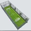 Outdoor Fenced Football Field With Green Grass Goalposts And Surrounding Trees
