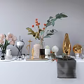 Elegant Decorative Ornament Set With Pink Flowers Red Berries Green Leaves Golden Vase And White Candles