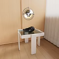 White Side Table With Glass Top Black Decor And Hanging Lamp On Wooden Floor