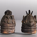 Traditional Decorative Ceramic Hats With Intricate Facial Features And Spiked Designs