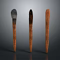 Wood And Stone Decorative Sculptures With Different Top Finishes On Dark Background