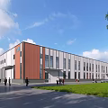 Modern Industrial Factory Building With Red Brown White Facade Green Lawn And People Walking