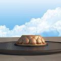 Golden Lotus Petal Shaped Sculpture In Circular Water Pool With Blue Sky And White Clouds