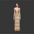 Woman With Long Red Hair Wearing Golden Fringed Long Dress Against Grey Background