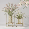 Two Golden Vases with Pink and White Flowers on Metal Stands for Interior Decor