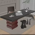 Modern Dark Top Desk with Red Stacked Base Laptop Headphones Green Plant and Brown Chair