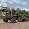 Camouflage Green Military Vehicle With Missile Launch System And Multiple Wheels On Desert Terrain
