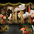Alice in Wonderland Themed Banquet Hall With Cards Flowers Decorations And String Lights