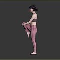 Woman Stretching Leg in Gray Tank Top and Pink Leggings Against Gray Background