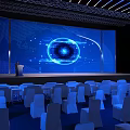 Modern Conference Hall Setup Featuring Blue Lighting Large Screen Eye Graphic And Seats
