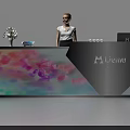 Stylish Reception Desk with Vase Flowers Tablet Colorful Petal Design Livenu Logo and Receptionist