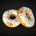 Freshly Made Two Delicious Donuts With White Frosting And Colorful Sprinkles