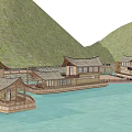 Scenic Waterfront Area With Traditional Wooden Buildings And Covered Boats Near Mountains