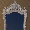 Ornate White Dressing Table With Carved Mirror And Orange Diamond Pattern Wall