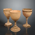 Three Vintage Decorative Ceramic Cups With Intricate Patterns And Ornate Bases