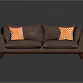 Brown Sectional Sofa with Orange Patterned Cushions and Wooden Legs in Modern Dark Setting