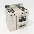 Beige Kitchen Appliance With Four Burner Gas Stove Double Drawer Oven And Stainless Steel Edge