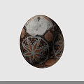 Intricately Decorated Egg Featuring Geometric Patterns In Brown And White Tones