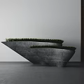 Stepped Gray Concrete Planters Planted With Lush Green Grass