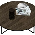 Round Wooden Coffee Table With Black Metal Legs Clear Glass Cups Magazines And White Bowl
