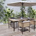 Outdoor Wooden Deck Dining Set With Wooden Table Woven Chairs Green Plants And Large Umbrella