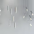Contemporary Pendant Lights With Various Modern Designs Gold Silver Finishes Warm Glow Grey Wall Interior