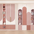 Stylish Pink And White Wardrobe With Curved Arched Design Storage Shelves Decorative Figurines And Clock