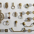 Various Brass Furniture Handles With Different Decorative Designs For Cabinets And Drawers