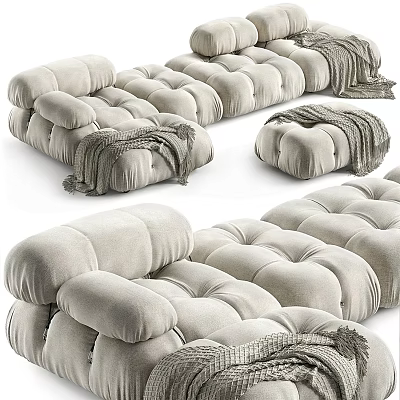 Light Beige Irregular Shaped Sofa With Plush Velvet Tufted Design And Knitted Blanket 3d model