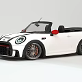 Sporty White Convertible Car With Red Side Mirrors Black Soft Top And Alloy Wheels