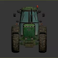 Green Tractor With Large Wheels And Yellow Rims On Reflective Surface
