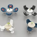 Various Colored Chair And Round Table Sets With Cushions And Flower Decorations
