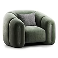 Green Velvet Single Sofa With Rounded Armrests And Metal Strip Accents And Gray Geometric Pillow