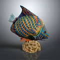 Vibrant Colorful Fish Sculpture With Blue Yellow Orange Stripes On Honeycomb Base